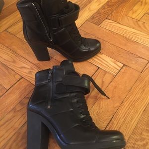 Prada leather lace-up ankle boots.